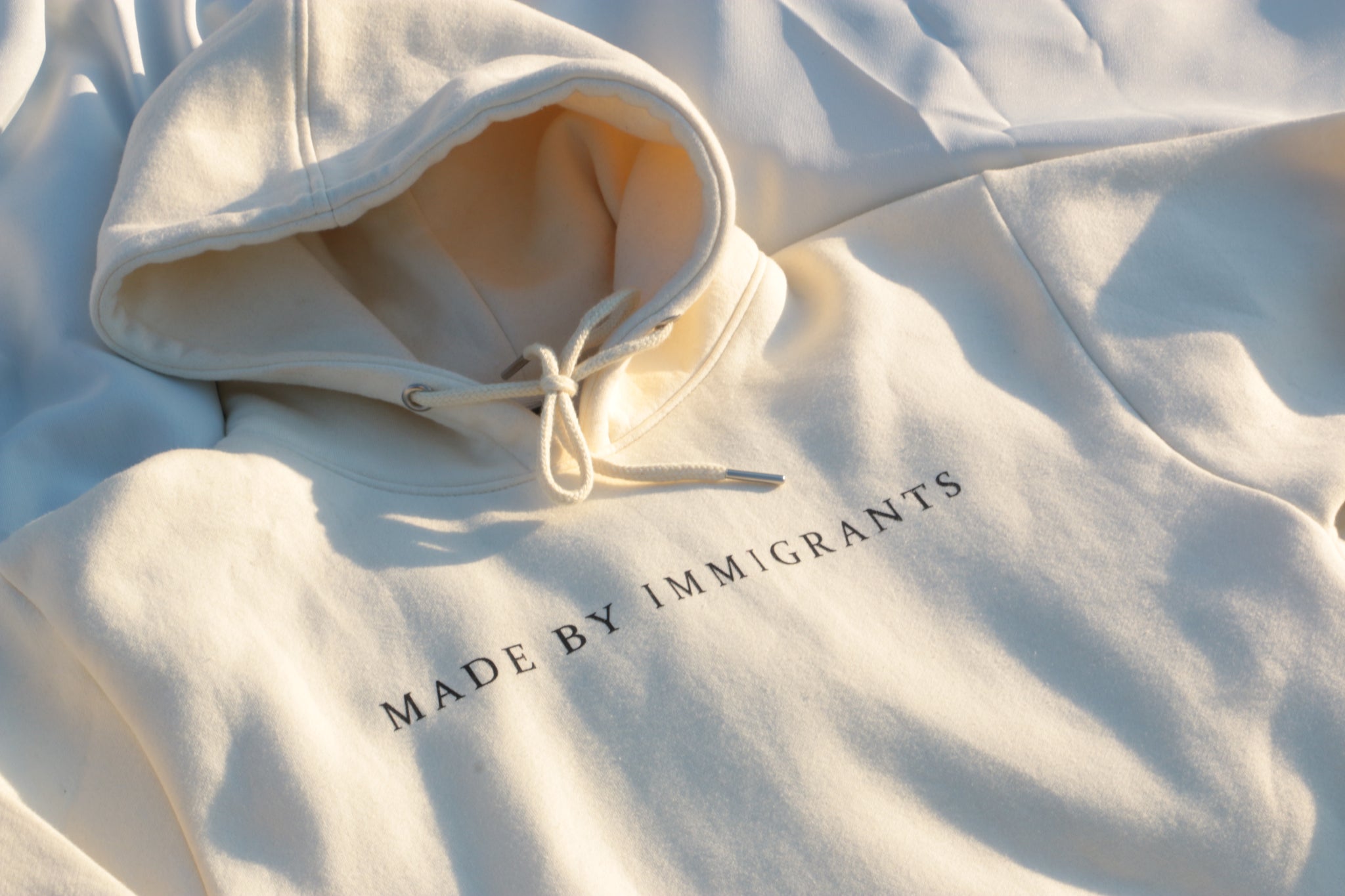 "Made By Immigrants" Cream Hoodie