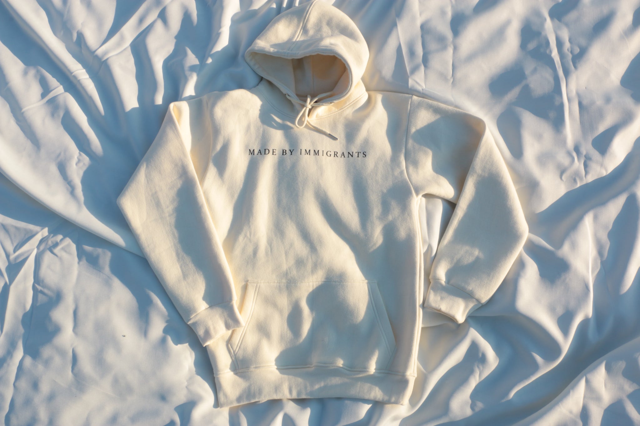 "Made By Immigrants" Cream Hoodie